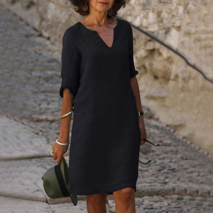 Vielseitiges Damenkleid Luna, kurzärmlig, feminin und bequem für Frühling und Sommer.