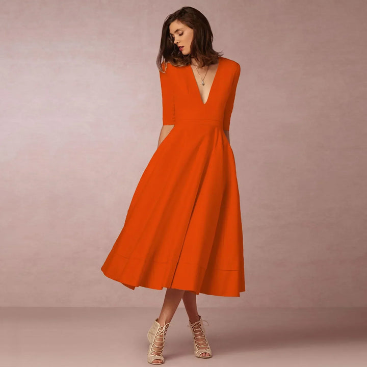 Elegantes Damen Midikleid, fließend und bequem, geeignet für Sommer, Partys und formelle Anlässe.