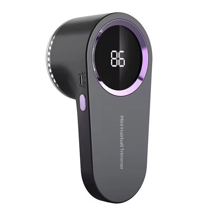 Tragbarer USB-aufladbarer Flusenentferner und Tierhaarentferner für frische, flusenfreie Kleidung.