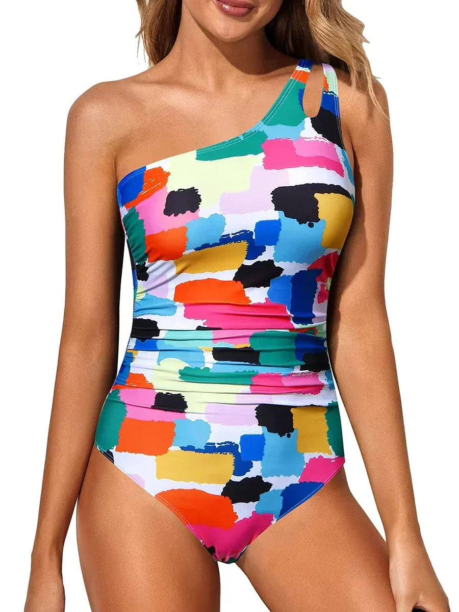 Moderner asymmetrischer Schwimmanzug Sola für Frauen, elegant & stilvoll am Pool und Meer.