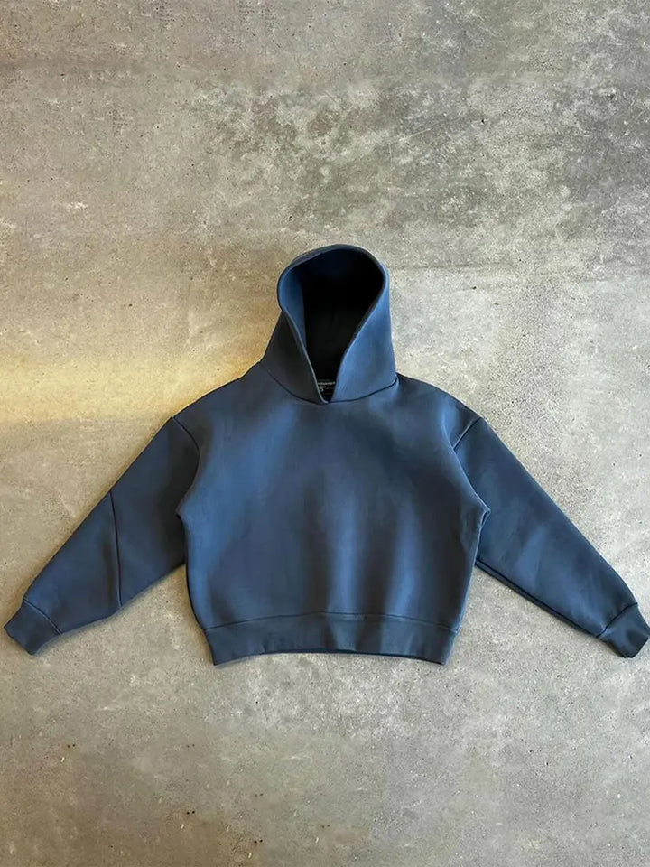 Trendiger Herren Oversized Hoodie und Jogger Set in Schwarz, perfekt für Winter-Streetwear-Looks.
