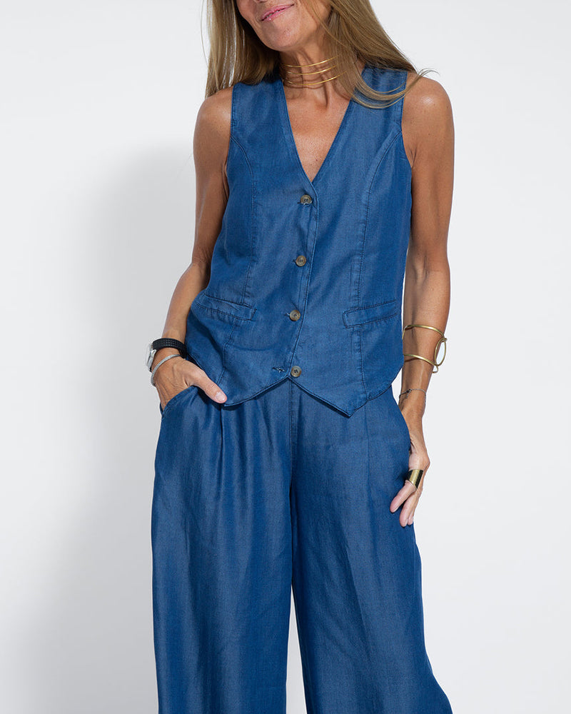 Damen Herbst Fashion Set mit ärmelloser Weste und weiter Hose, ideal für einen lässigen Chic.