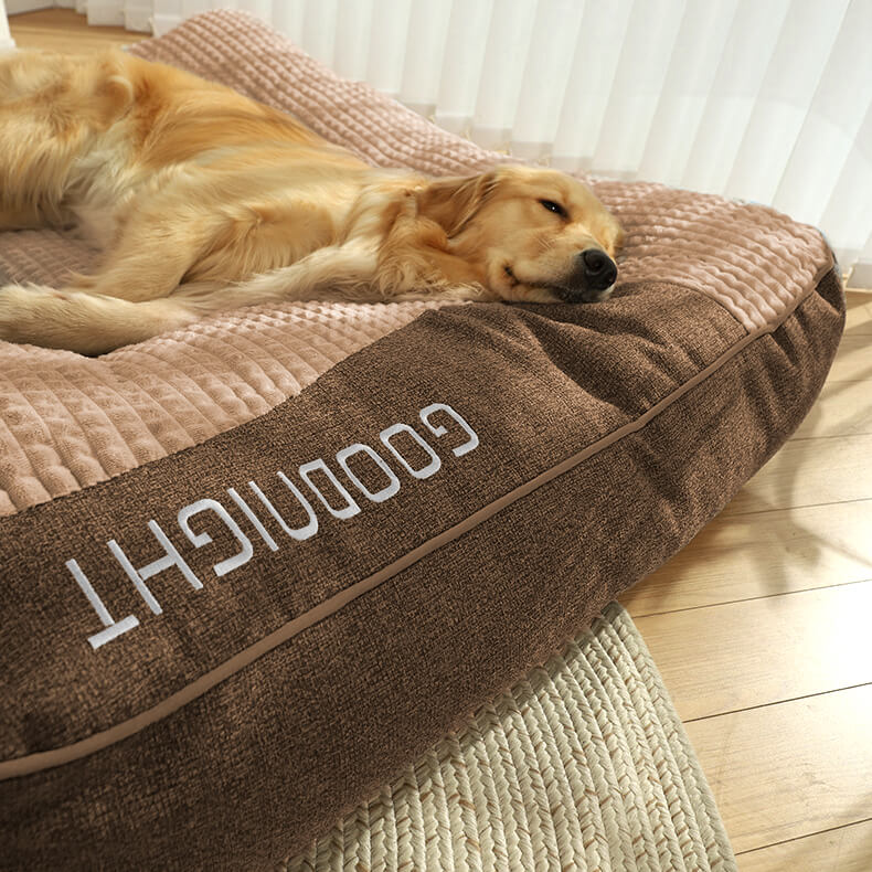 Premium-Hundebett: orthopädisch, kratzfest und gelenkschonend mit bequemer Stützfunktion durch erhöhten Rand.