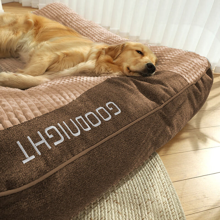 Premium-Hundebett: orthopädisch, kratzfest und gelenkschonend mit bequemer Stützfunktion durch erhöhten Rand.