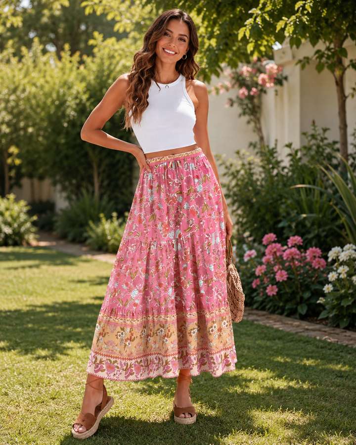 Damen Vintage Rosa Boho-Maxikleid, fließend & elegant. Perfektes Sommer- & Strandkleid mit Blumenmuster.