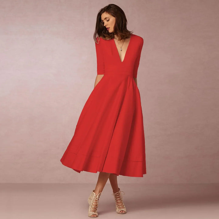 Schmeichelndes, elegantes Damen Midikleid mit fließendem Fall, perfekt für Cocktailpartys und Hochzeitsgäste.