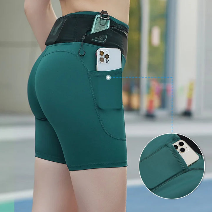 Damen Kompressionsshorts für Fitness-Training; hochelastisch, mit Taschen für Handy & Schlüssel.