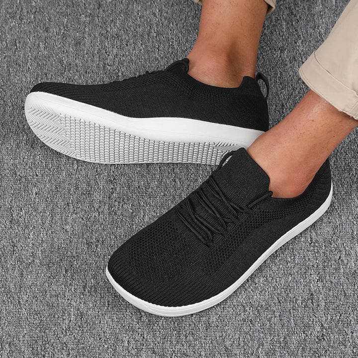 Orangefarbene Herren Sneaker, atmungsaktiv, weite Zehenbox, ideal für Freizeitaktivitäten.