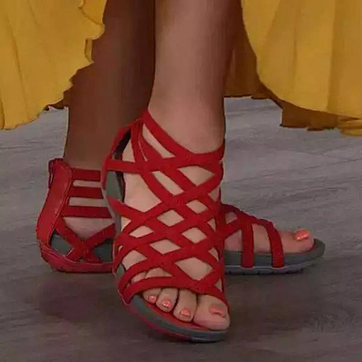 Damen Gladiator Sandalen mit schweißabsorbierender Sohle, bequeme Flachsandale für heiße Sommertage. Optimaler Komfort.