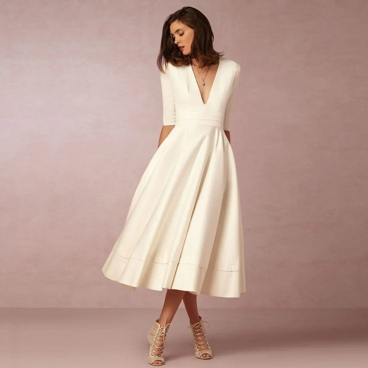 Elegantes fließendes Damen Midikleid, perfekt für festliche Anlässe oder als stilvolles Abendkleid.