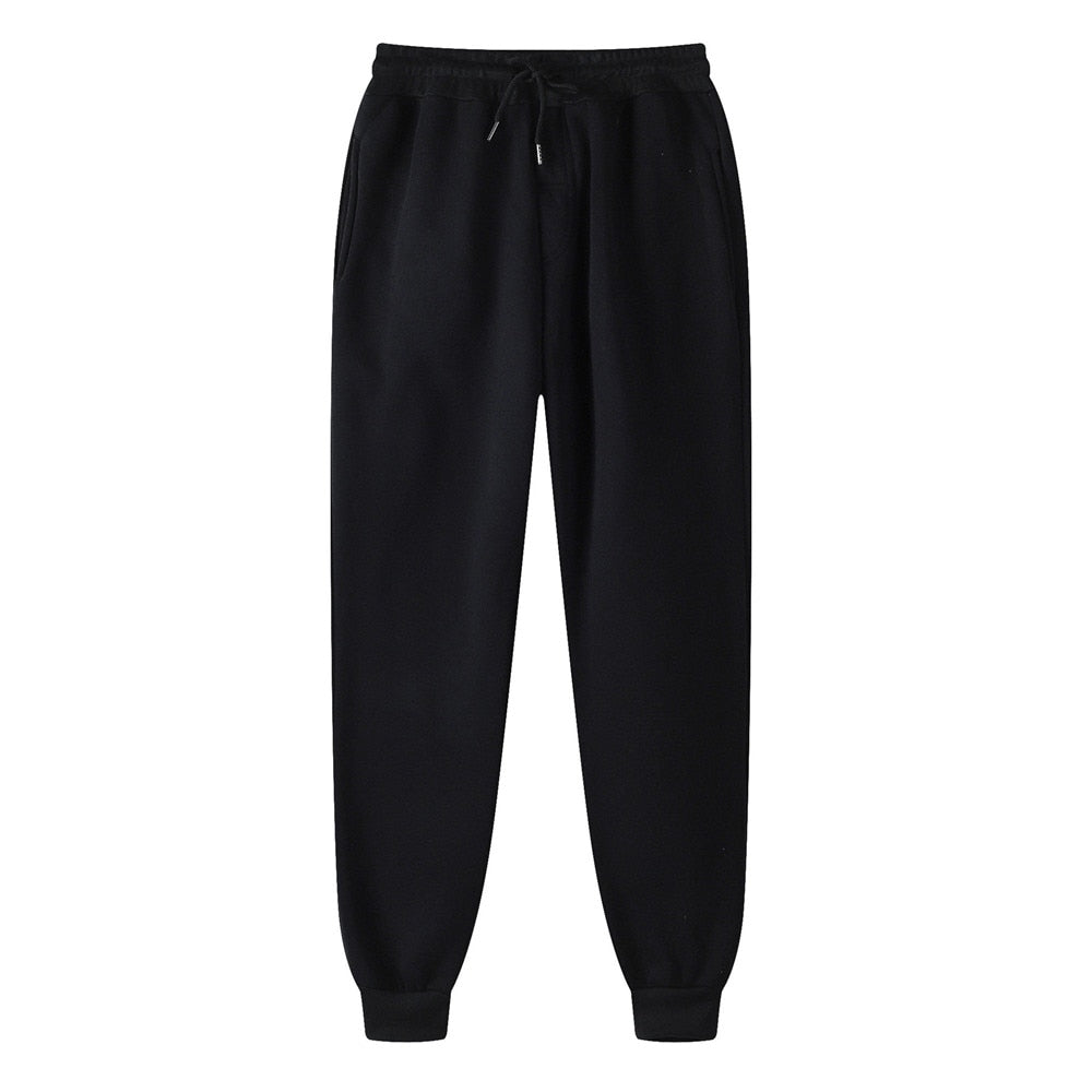Stilvoller Damen Jogginganzug in klassischem Schwarz, perfekt für gemütliche Stunden & sportliche Aktivitäten.