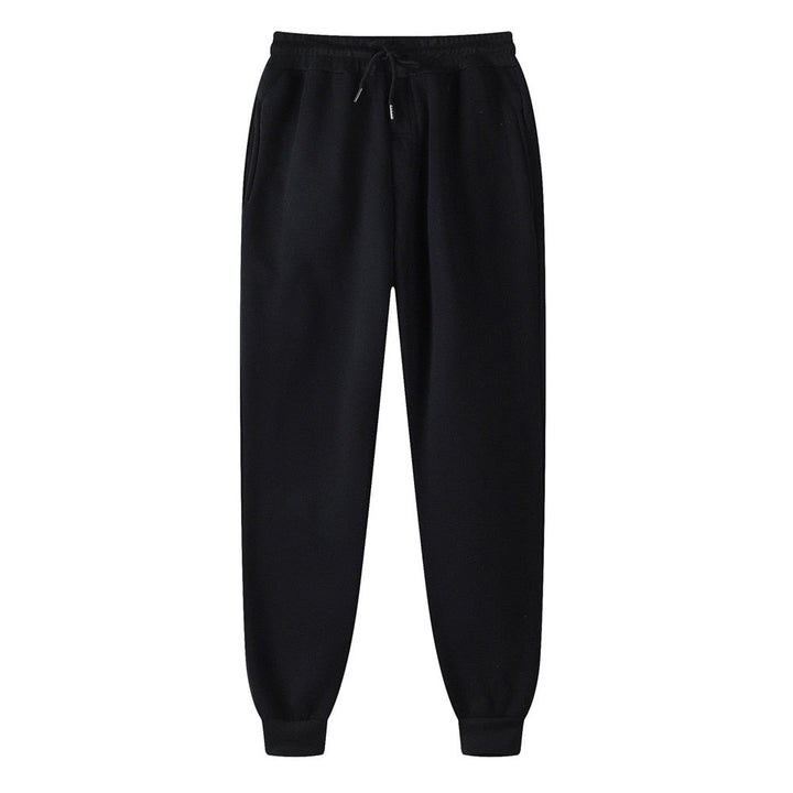 Stilvoller Damen Jogginganzug in klassischem Schwarz, perfekt für gemütliche Stunden & sportliche Aktivitäten.
