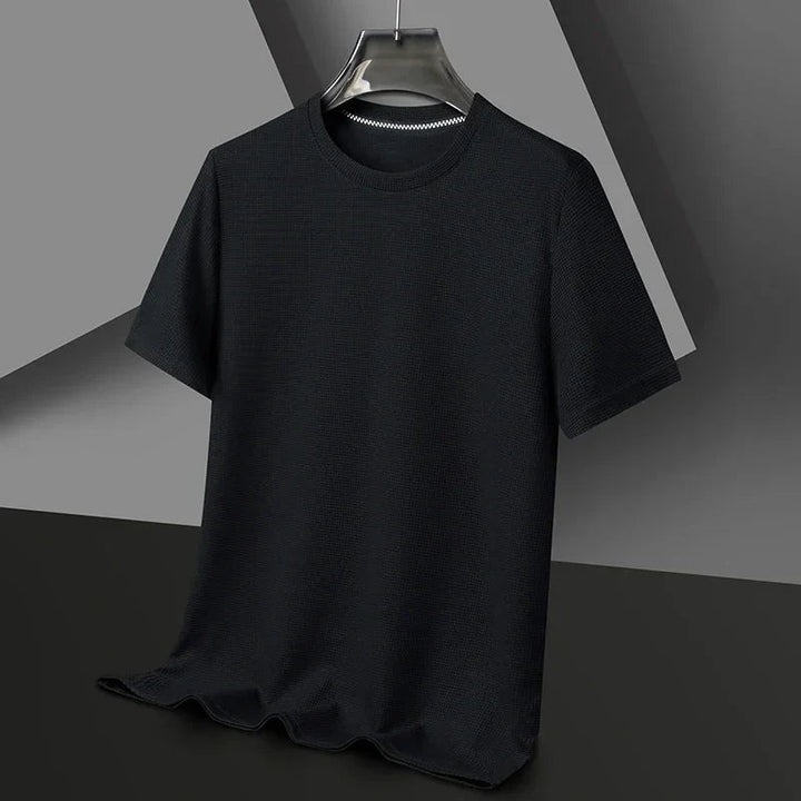 Modernes Kurzarm Herren T-Shirt mit Rundhals und bequemer Waffelstruktur.