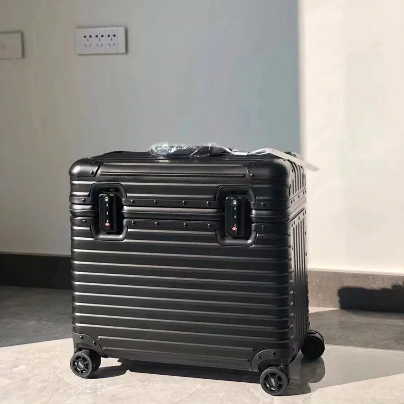 Stilvoller grauer Aluminiumkoffer Monaco; robuster Hartschalen-Trolley mit reisefreundlichem TSA-Schloss.