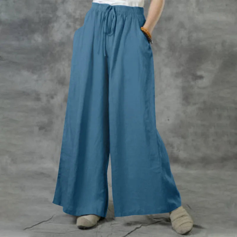 Zeitlose Damenhose mit weitem Bein und bequemem elastischen Bund, für entspannte Eleganz und Komfort.