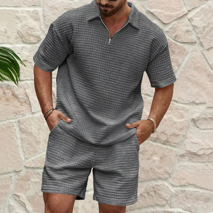 Bequemes Herren Polo-Set mit strukturierter Optik, Kurzarmshirt & Shorts, perfekt für den Alltag.
