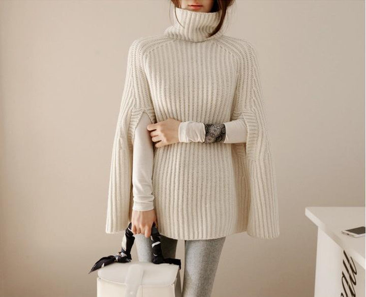 Elegantes dreiteiliges Damen Winterset: stilvolle Daunenjacke, Rollkragenpullover & passende Hose.