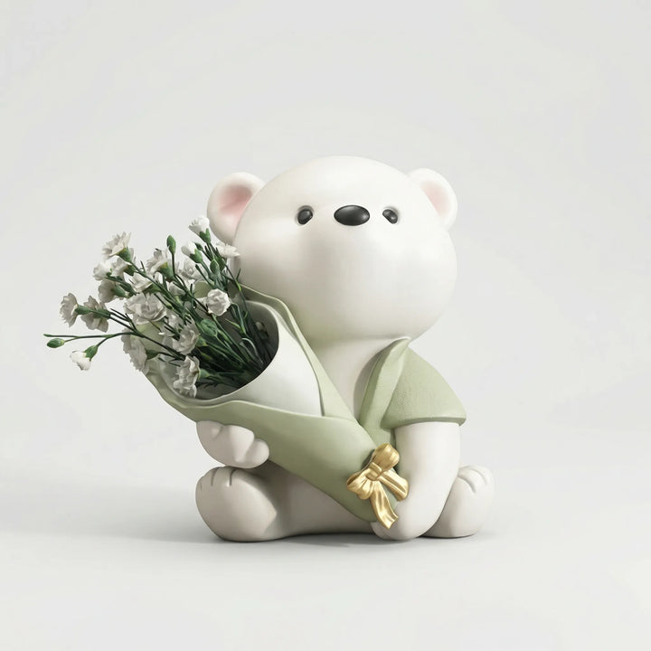 Bärchen-Figur mit Blumenstrauß als skandinavische Tischdeko. Detailreiches Wohnaccessoire in Braun, Rosa, Grün.