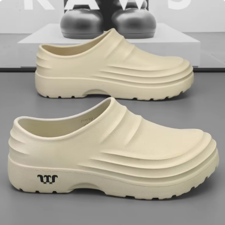 Ergonomische AquaStep Clogs: Wasserdicht, orthopädisch geformt. Optimaler Komfort für Damen & Herren mit Fußproblemen.