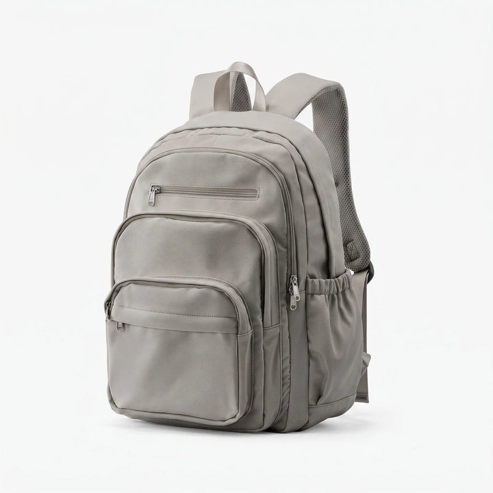 Grosser Schulrucksack offen mit Laptop, Büchern & Fächern; perfekt organisiert für Schule & Studium.