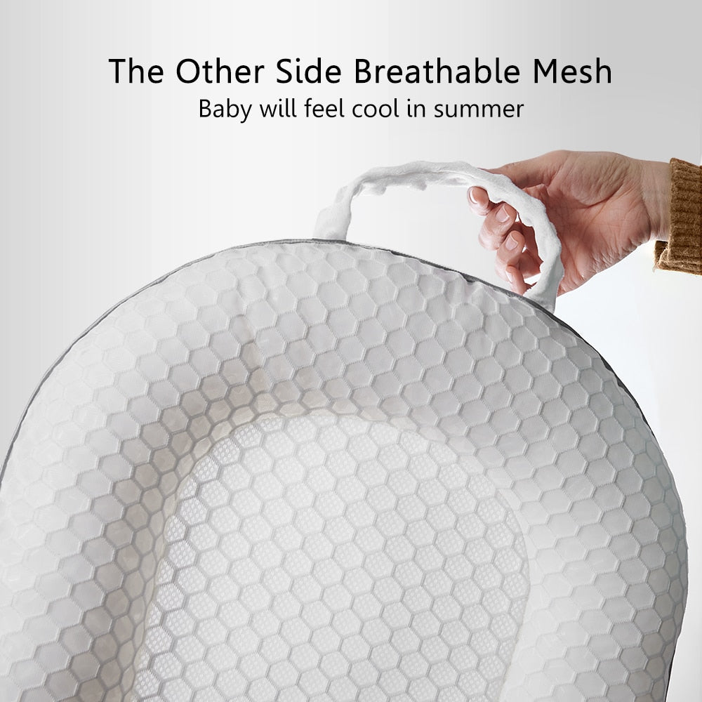 Babynest ergonomisch gestaltet mit Rückenstütze für gesunde Haltung des Babys. Ideal für Neugeborene, tragbar.