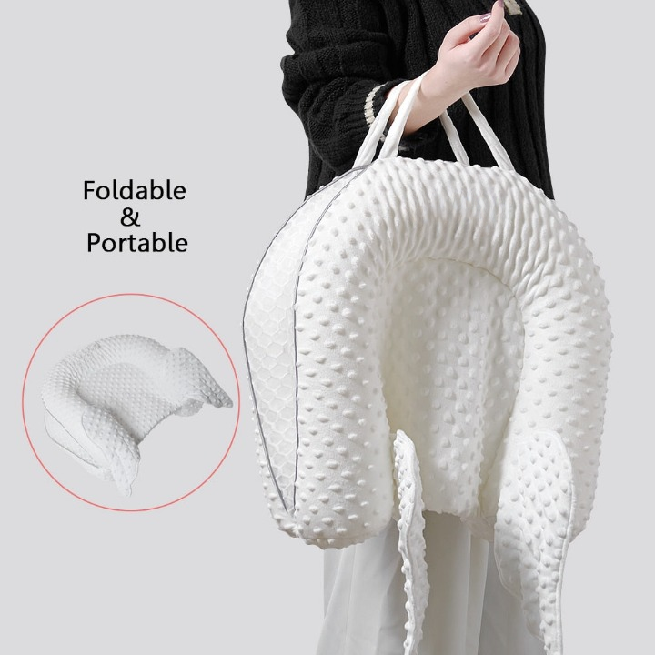 Ganzjähriges, ergonomisches Babynest mit Rückenstütze und atmungsaktivem Mesh. Fördert Geborgenheit und Komfort für Babys.