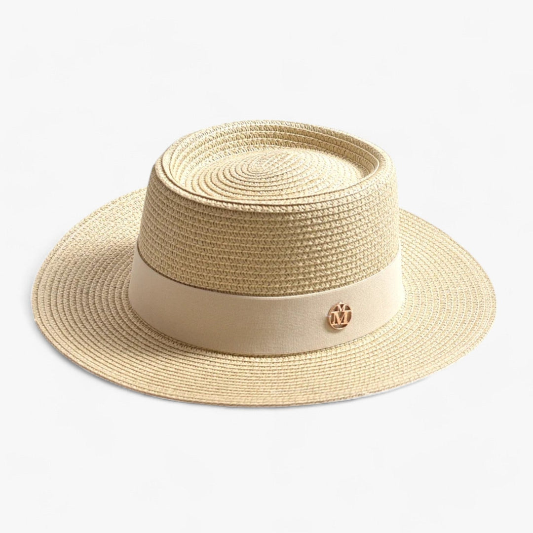 Klassischer Damen Strohhut mit breiter Krempe, ein zeitloser Sonnen- und Freizeithut für den Sommer.