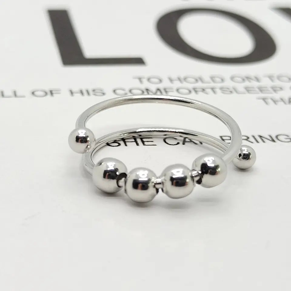 Unisex Anti-Stress Spinner-Ring in Silber, beruhigender Angstlöser & stilvoller Schmuck für Damen & Herren.