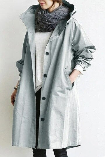 Modischer Damen Trenchcoat in Beige, wasserabweisend, ideal für Büro und Freizeit. Bequemer Herbstmantel.