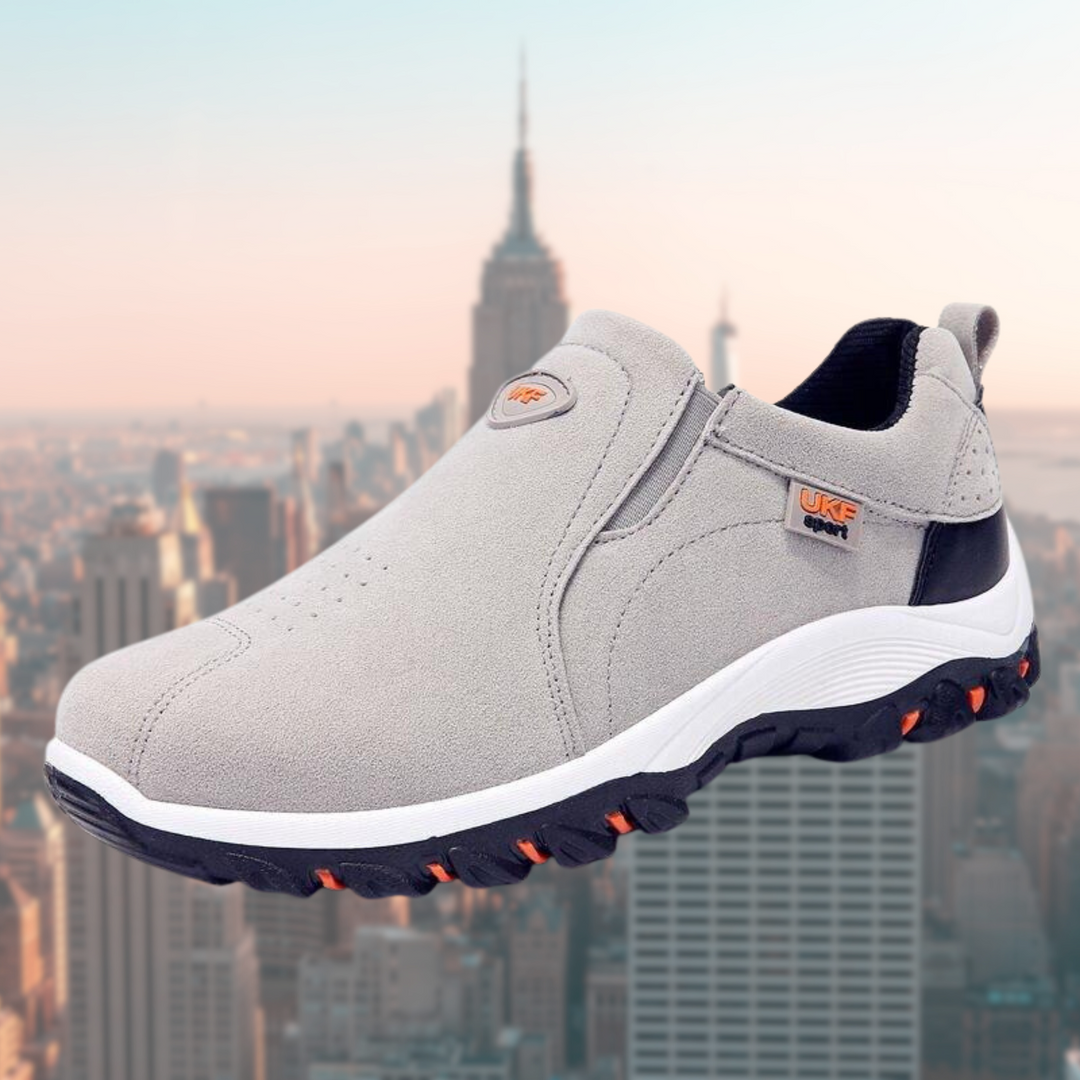 Stylische Männerschuhe: graue Slip-Ons mit komfortabler, stoßdämpfender Sohle. Ideal für Freizeit und Alltag.