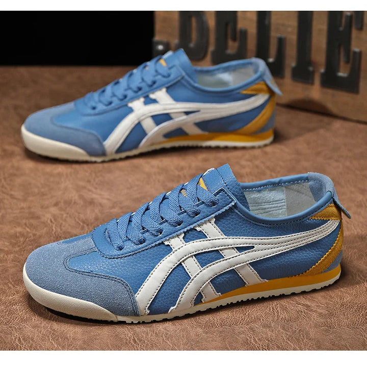 Trendige Herren Retro Sneaker in Orange mit Kontraststreifen und sportlichem Design. Vintage Look.