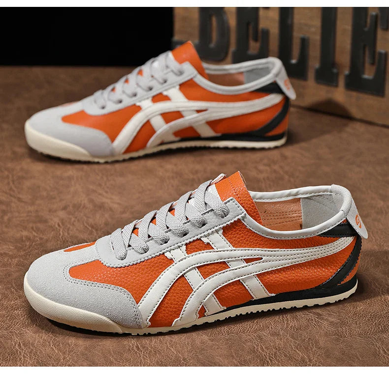Grüner Herren Retro Runner mit Kontraststreifen, ideal als bequemer Freizeitschuh im Vintage-Stil.