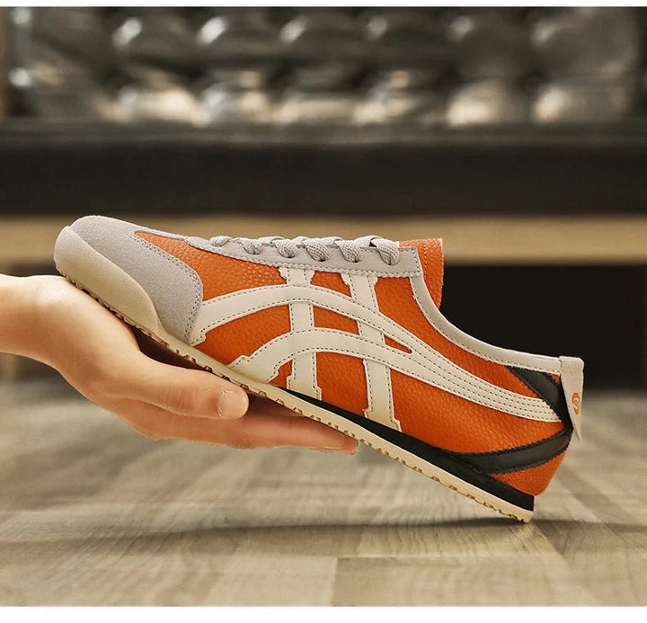 Klassische Herren Retro Runner Schuhe mit auffälligen Kontraststreifen für lässigen Look. Hoher Komfort.