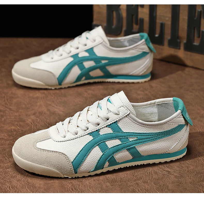 Sportliche Herren Retro Sneaker in Blau-Grün mit Kontraststreifen. Perfekt für Freizeit & Alltag.