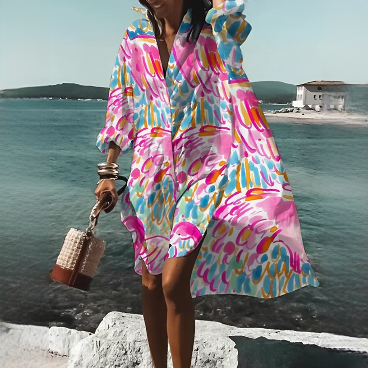 Lockeres Boho Midikleid für Damen. Buntes Printkleid mit V-Ausschnitt, perfekt für Freizeit & Frühling.