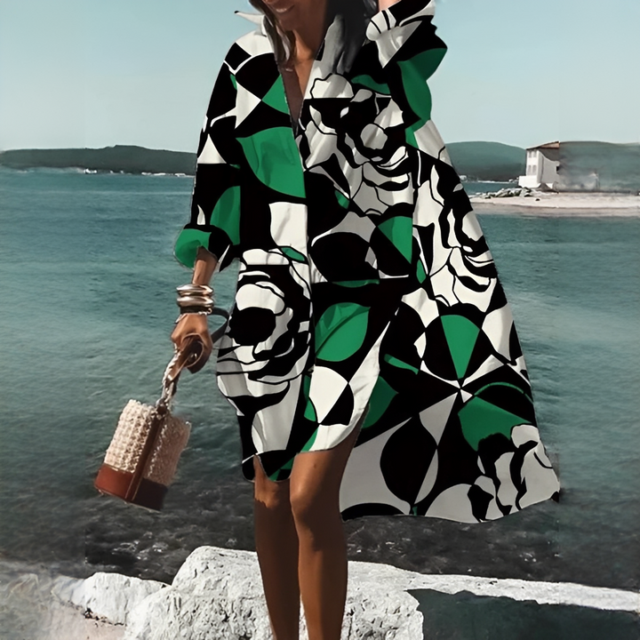 Bequemes Damen Strand- & Freizeitkleid. Fließendes Midikleid mit geometrischem Print & femininem V-Ausschnitt.