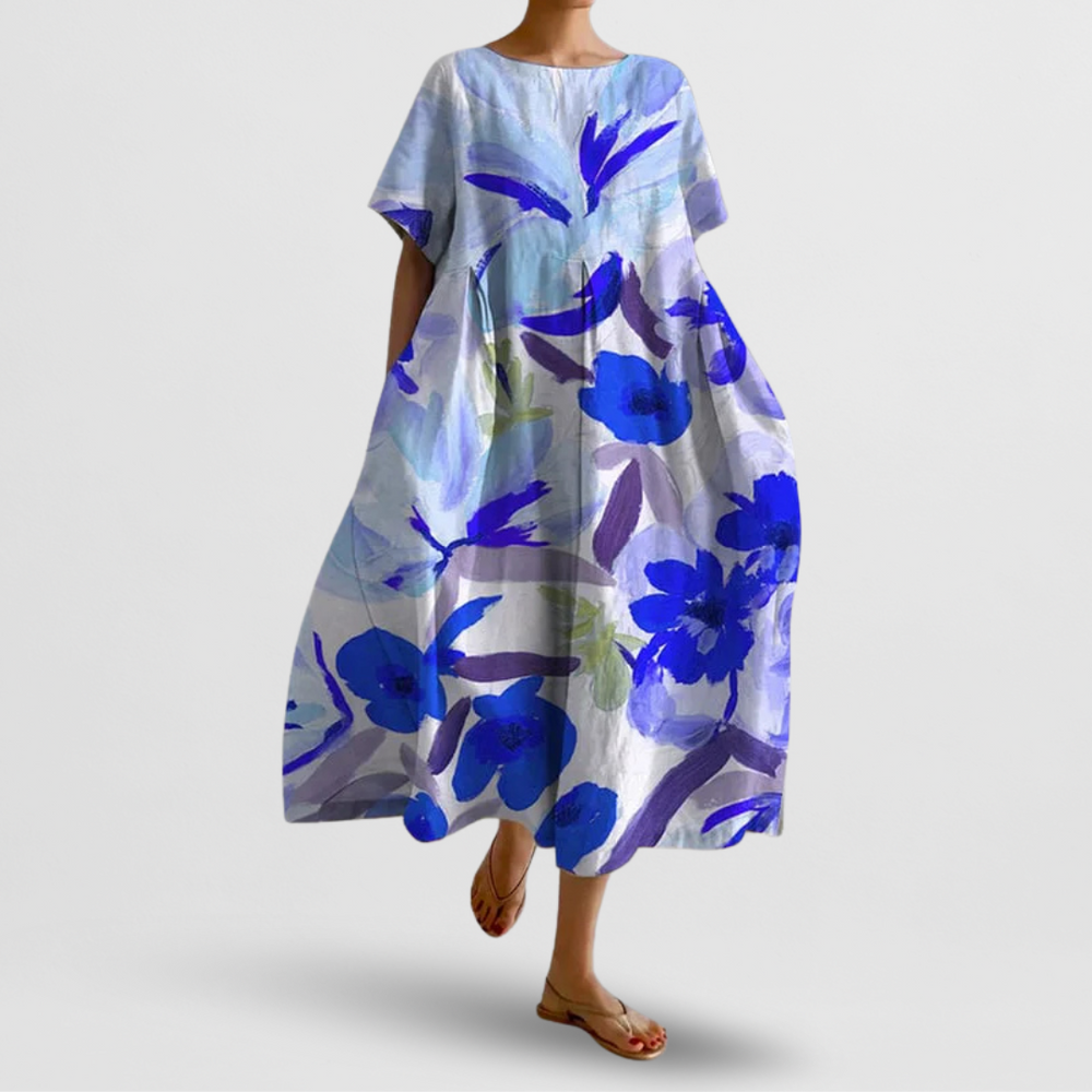Bequemes Damen Sommerkleid mit elegantem Blumenmuster und praktischen Taschen. Perfekt für warme Sommertage.