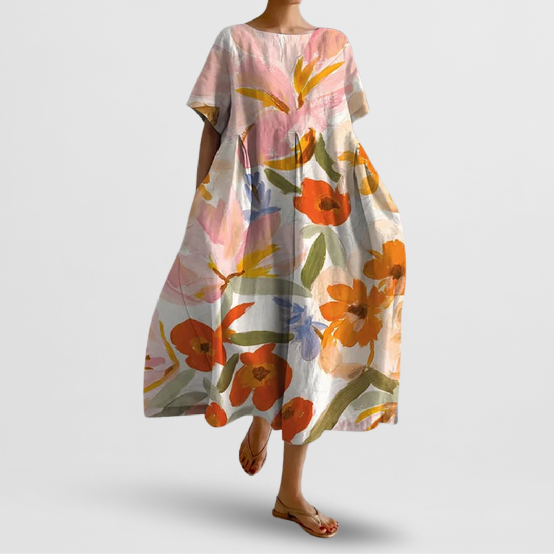 Damen Maxikleid mit kunstvollem Blumenprint, Oversized-Passform. Ideal für Sommermode, Strand & Freizeit.