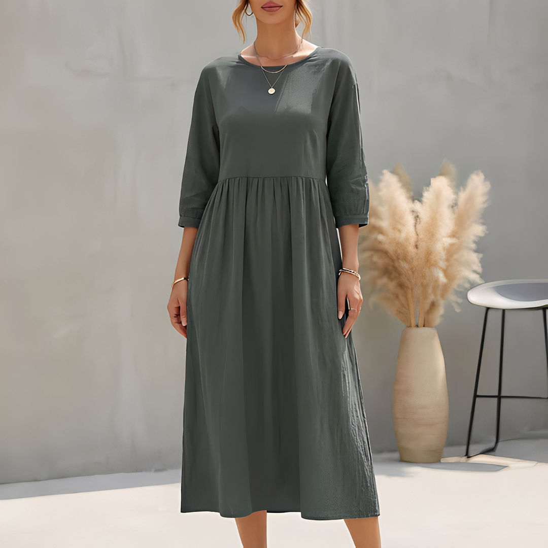 Vielseitiges Damen Sommer Midikleid mit 3/4-Ärmeln und Empire-Taille, ideal als Freizeit- oder Frühlingskleid.