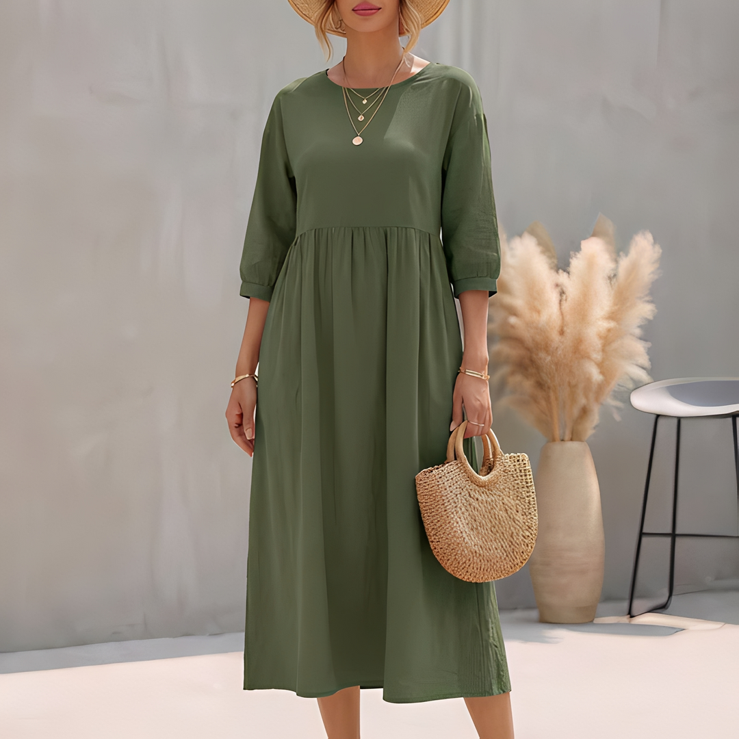 Figurschmeichelndes Damen A-Linien-Kleid Midi mit Empire-Taille, 3/4-Ärmeln und Seitentaschen für Eleganz.