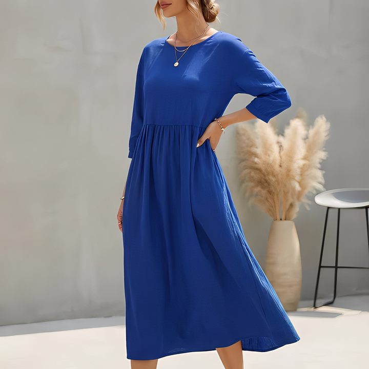 Luftiges Damen Sommerkleid Midi mit 3/4-Ärmeln, Empire-Taille und praktischen Seitentaschen, sehr bequem.
