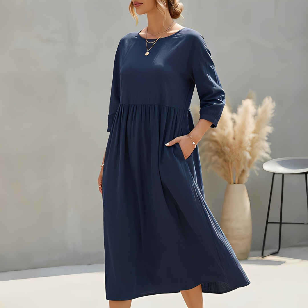 Schickes Damen Herbstkleid in Midilänge, mit 3/4-Ärmeln und eleganter Empire-Taille, ideal für Übergangszeiten.