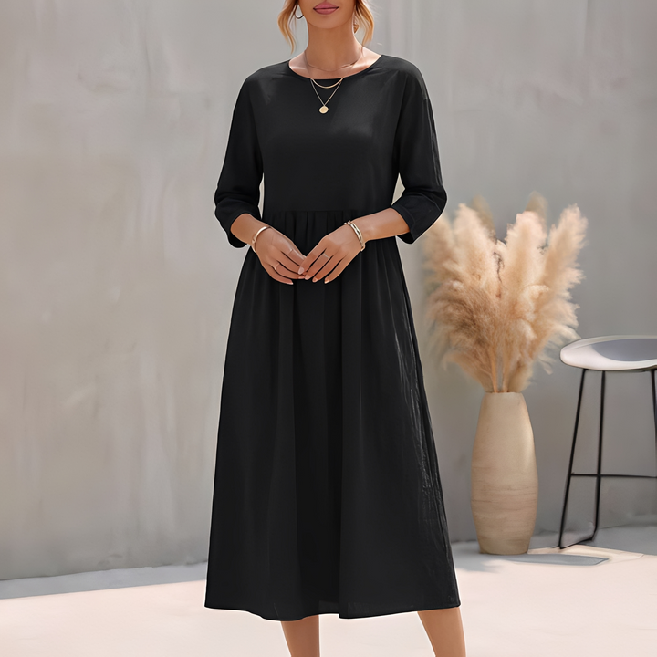 Damen Freizeitkleid Midi, elegant geschnitten mit A-Linie, 3/4-Ärmeln und schmeichelnder Empire-Taille.