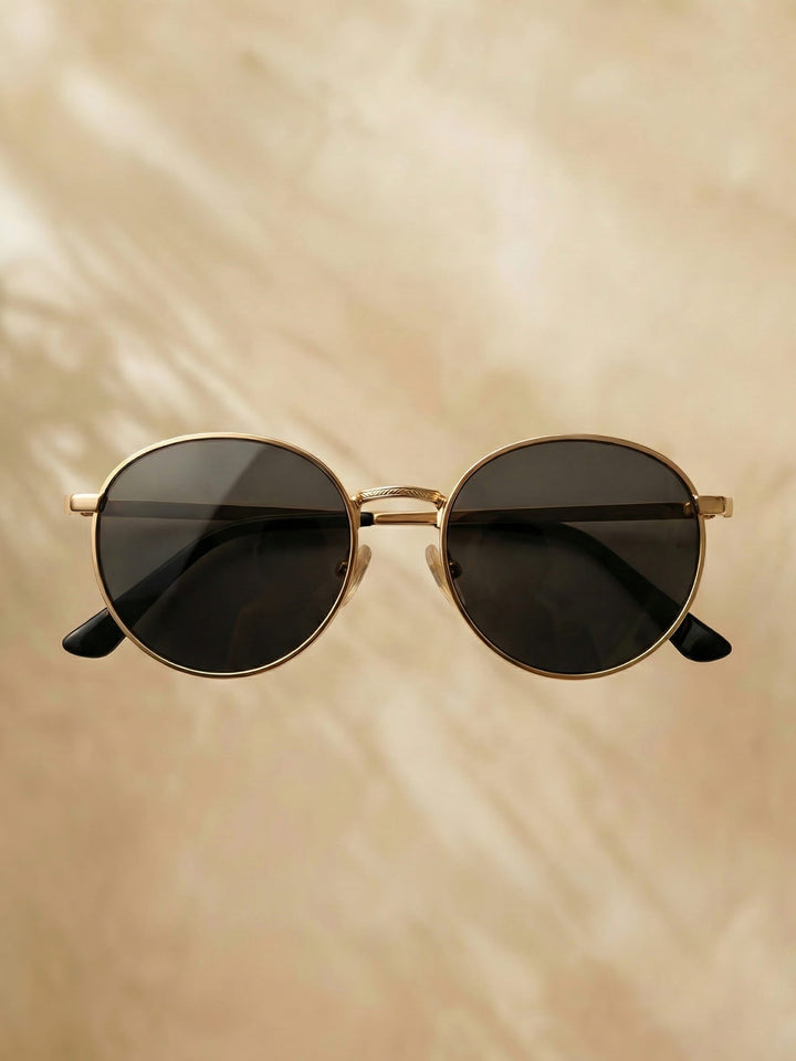 Herren-Sonnenbrille rund mit Metallgestell. Schützt vor UV-Strahlung, stilvoll für Sommer und Freizeit.