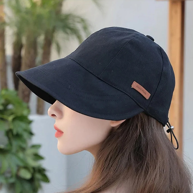 Faltbarer Damen Sonnenhut mit UV-Schutz in Beige, ideal für Strand und Garten.