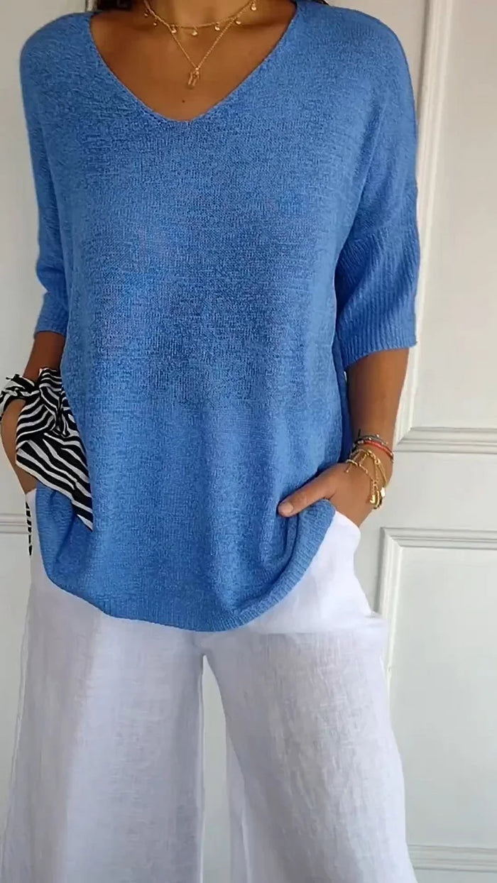 Bequemes Damen Top mit V-Ausschnitt und 3/4-Arm in lockerer Passform; perfekt für Casual Chic.