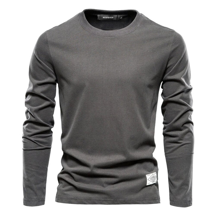 Essentielles Herren Rundhals-Sweatshirt für cleane Layer-Looks, ein modernes Langarmshirt.