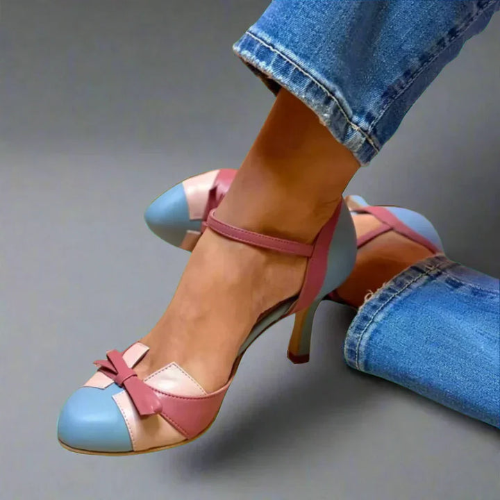 Elegante Damen Pumps mit femininer Schleife und bequemem mittelhohem Absatz, ideal für Büro oder Festlichkeiten.