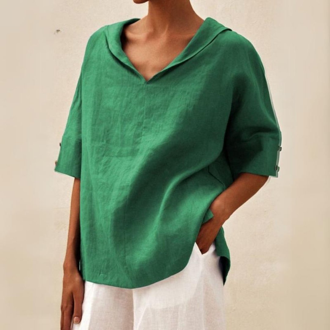 Elegantes Damen V-Ausschnitt Top mit Umlegekragen. Fließendes Oversized Design, ideal als stilvolle Freizeitbluse.