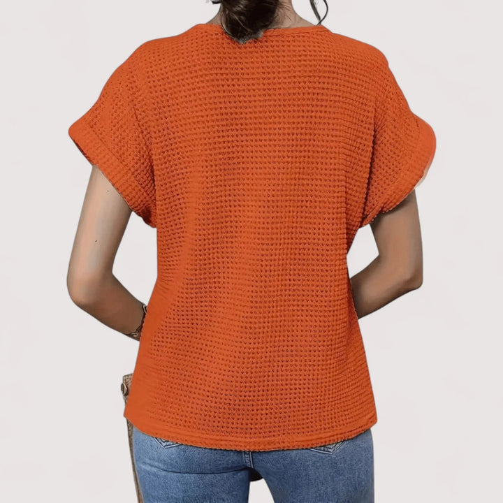 Modisches Kurzarm Top für Damen mit Waffelstruktur, Rundhals und elegantem Spitzendetail.